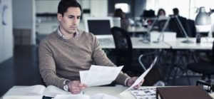 sales recruiter reading resume
