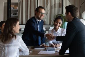 sales people in a meeting