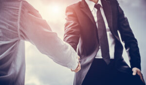 sales candidate shaking hands