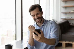 Picture of a salesman celebrating a successful job interview